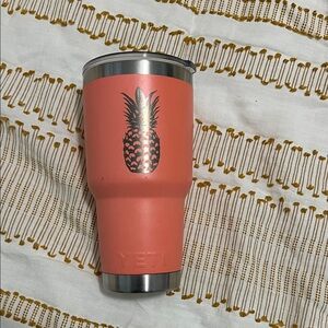 Yeti Coral Tumbler with Black Pineapple Graphic
